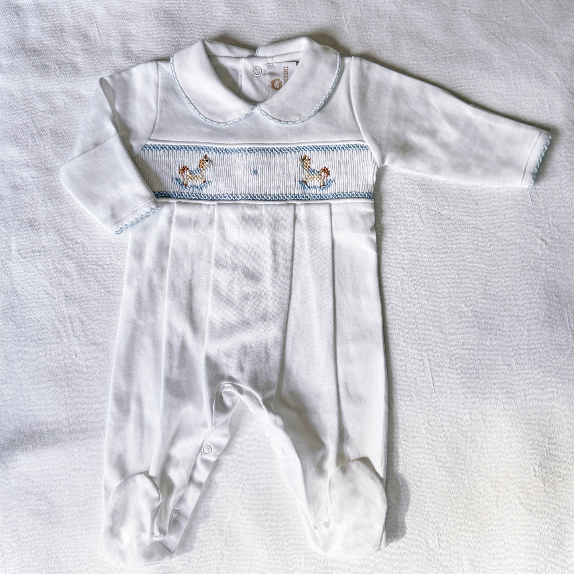 Pijama enterizo ponis blanco