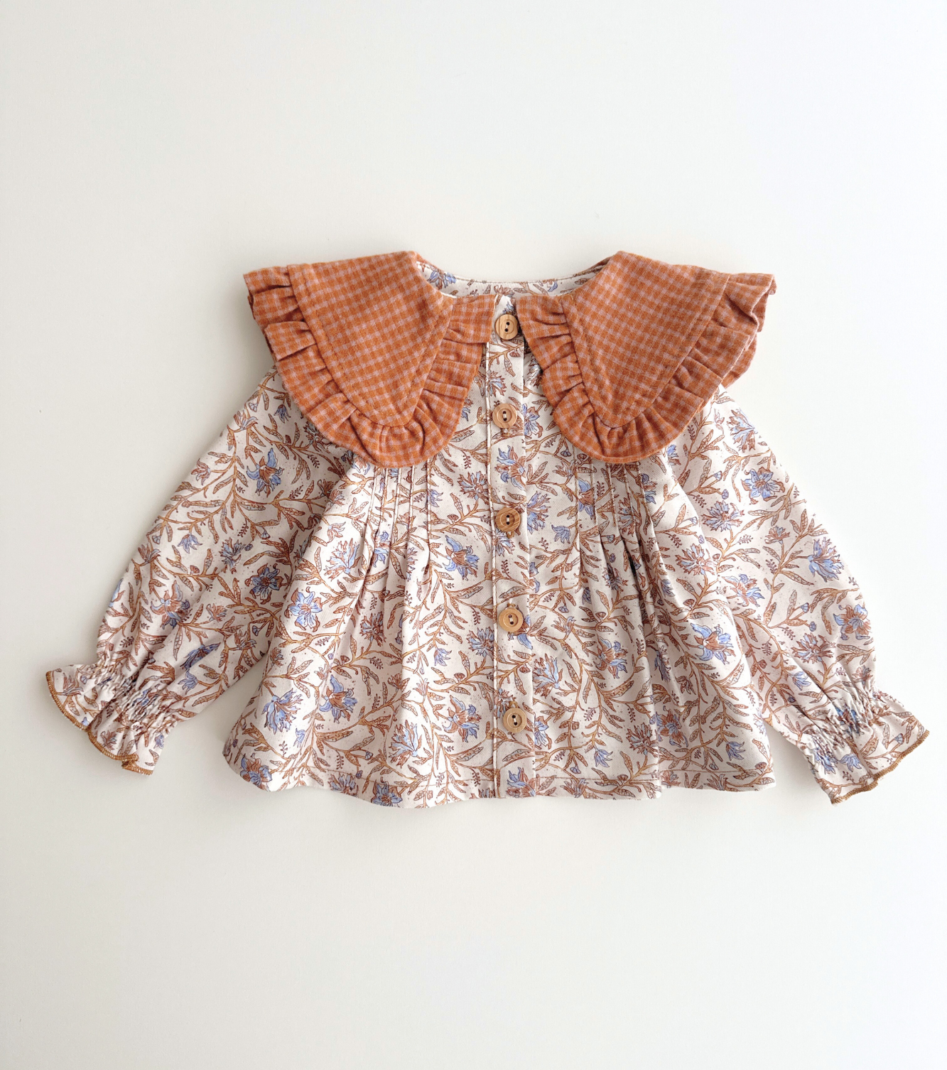 Blusa jaretas | Raíz | Flores y Cuadros