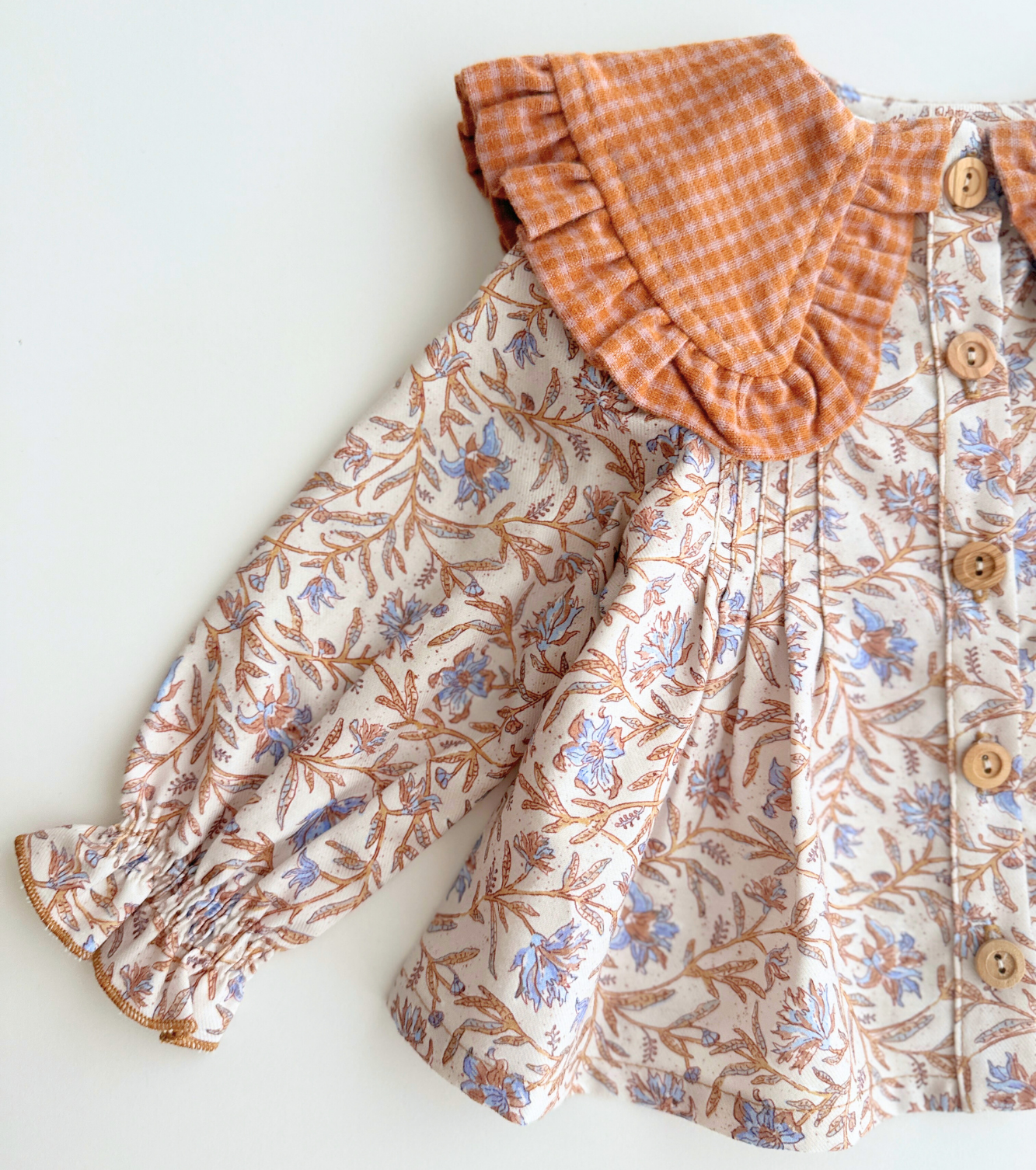 Blusa jaretas | Raíz | Flores y Cuadros