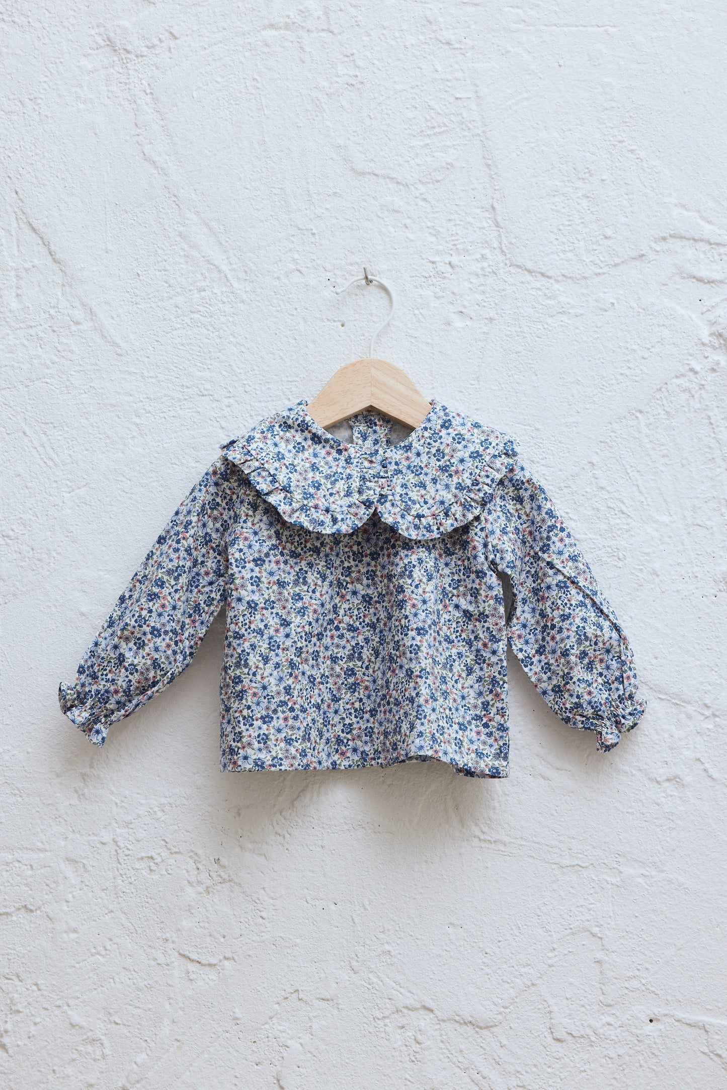 Blusa flor azul