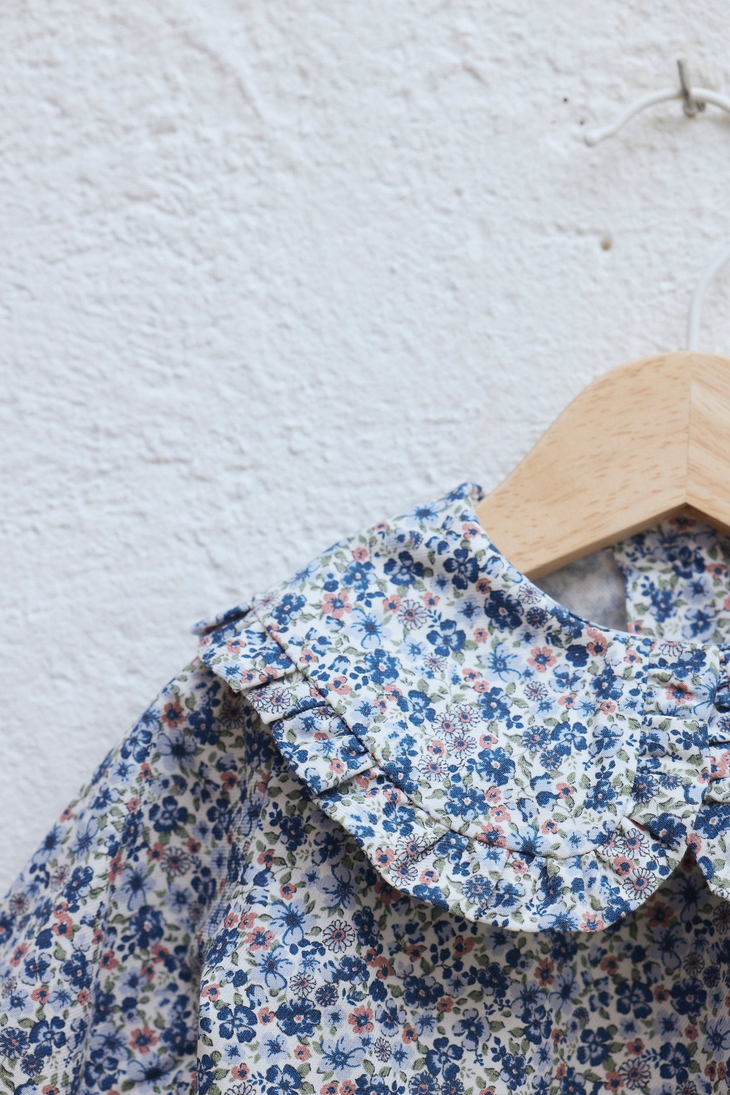 Blusa flor azul