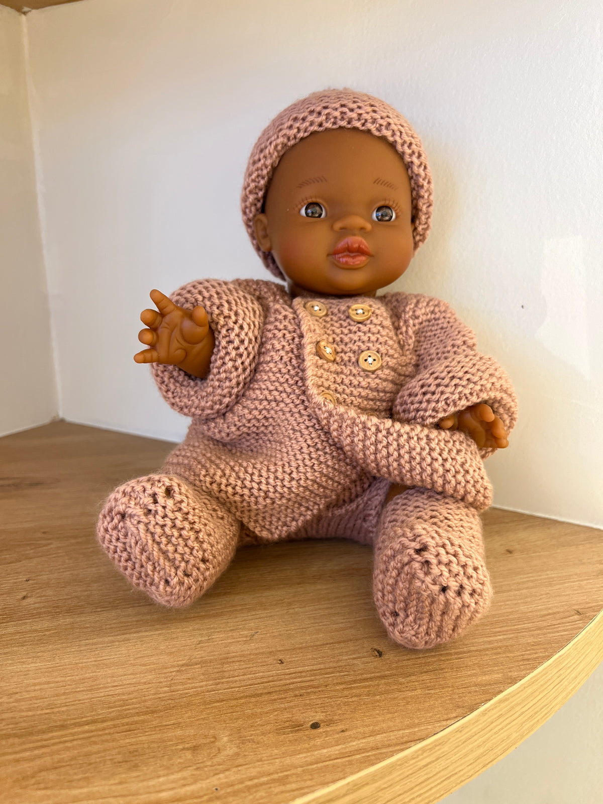 Muñeca Pocholita abrigo rosa empolvado