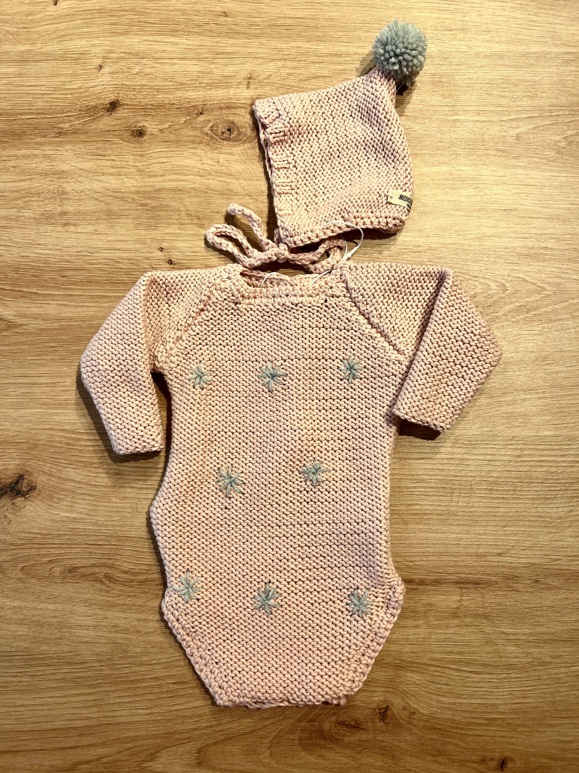 Conjunto pelele + capota estrellas rosa