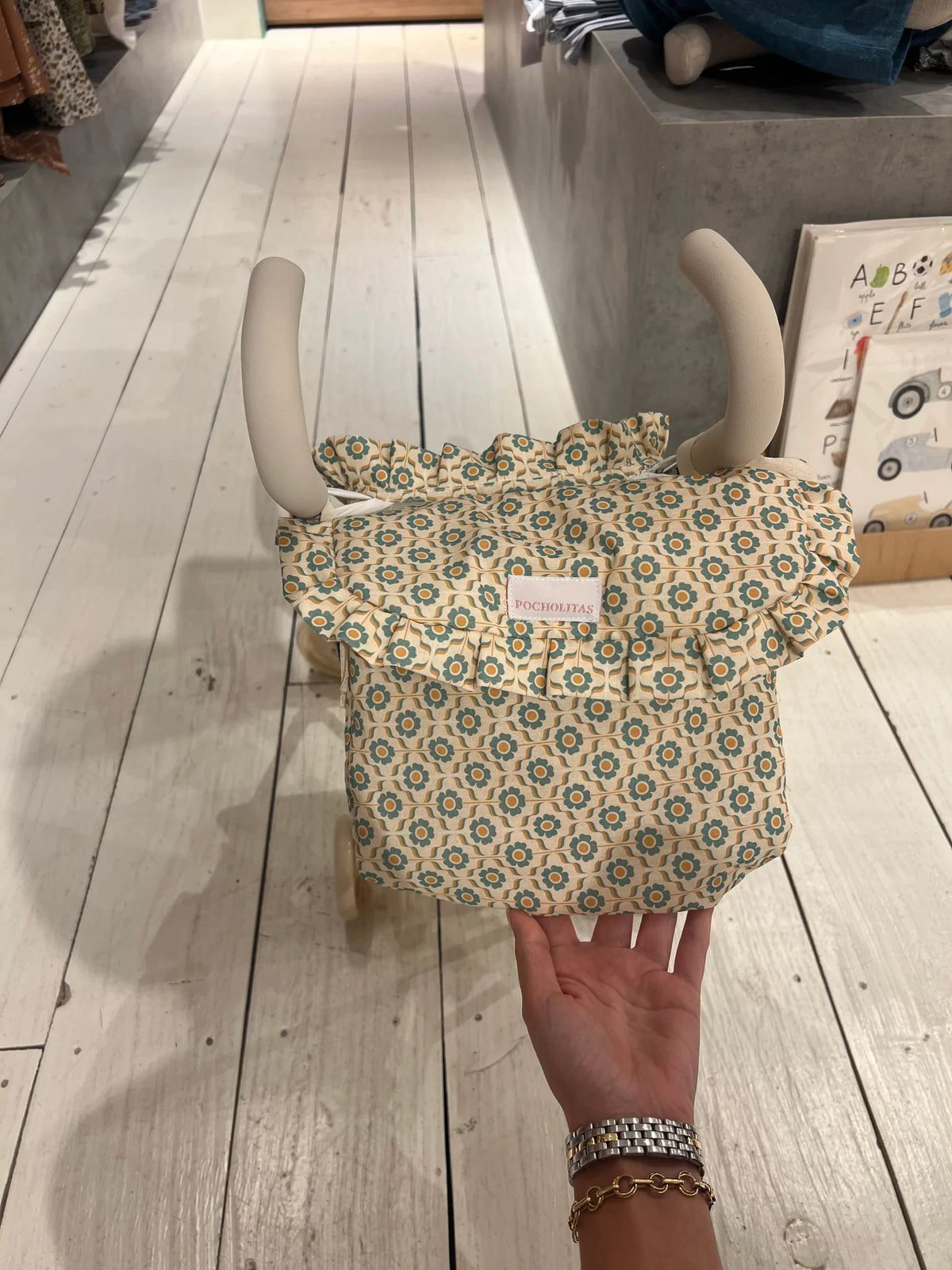 Bolsa sillita de paseo flores naranjas