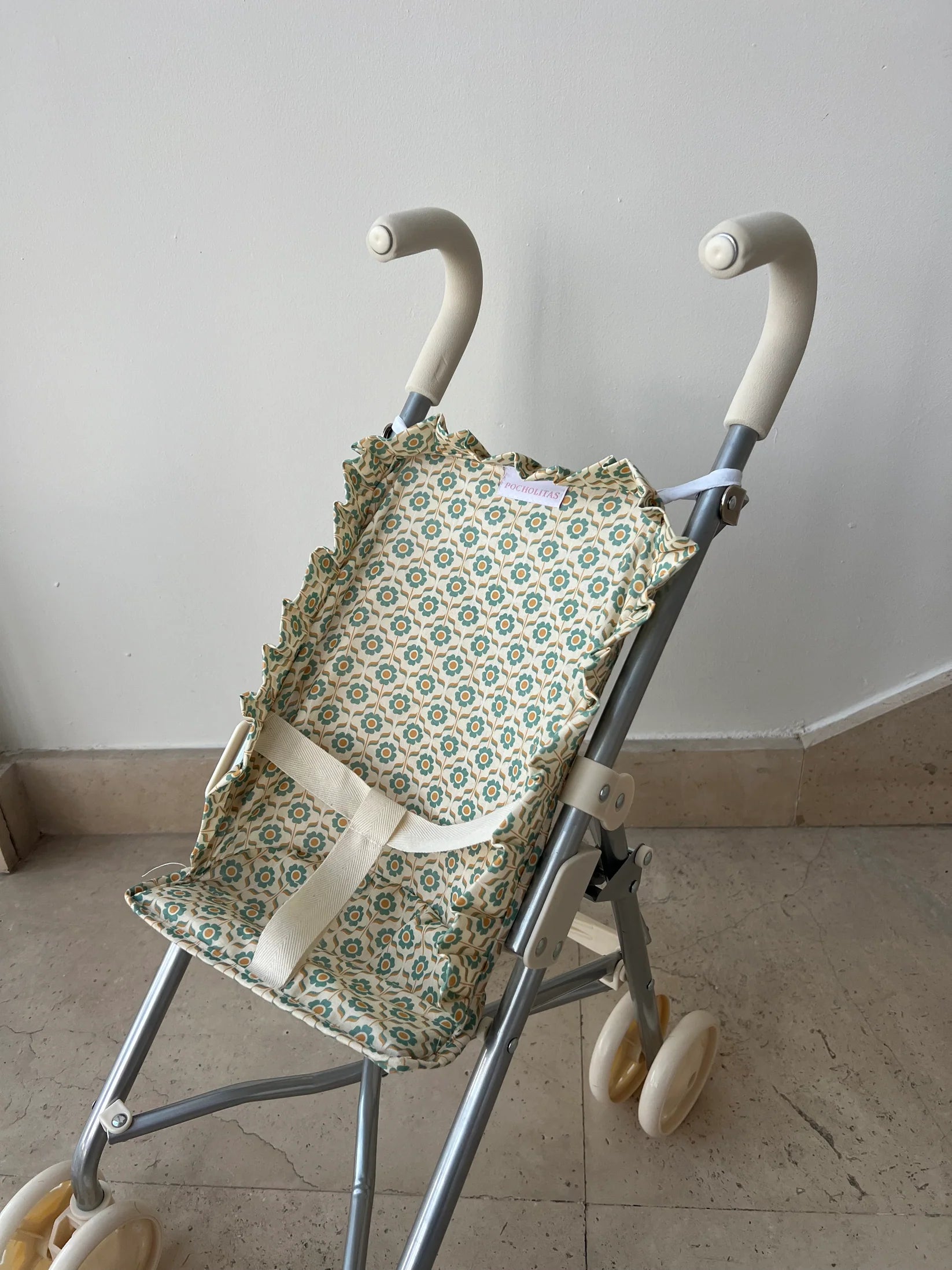 Sillita de paseo flores naranjas