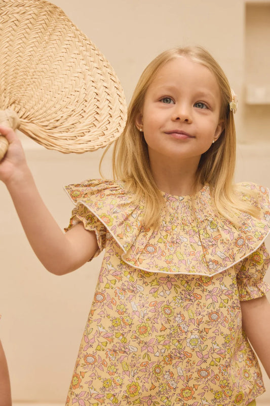 Blusa flor amarilla