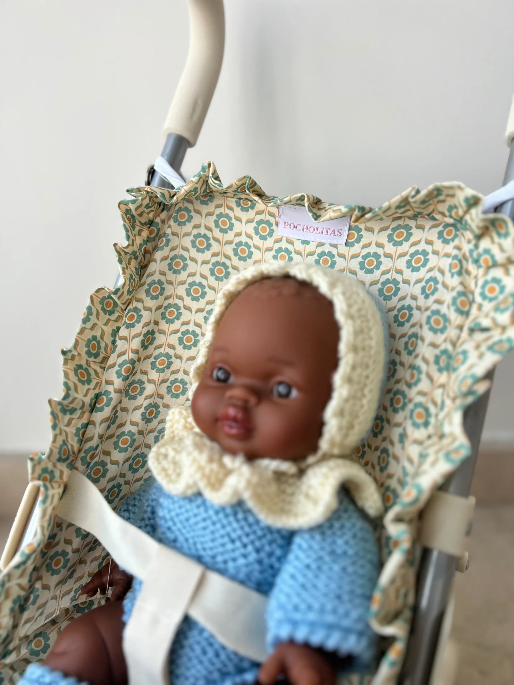 Sillita de paseo flores naranjas