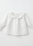 Blusa cuello corazón blanco