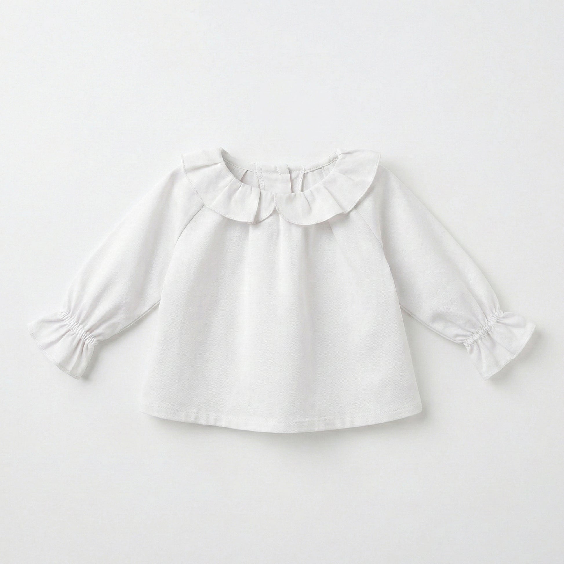 Blusa cuello corazón blanco