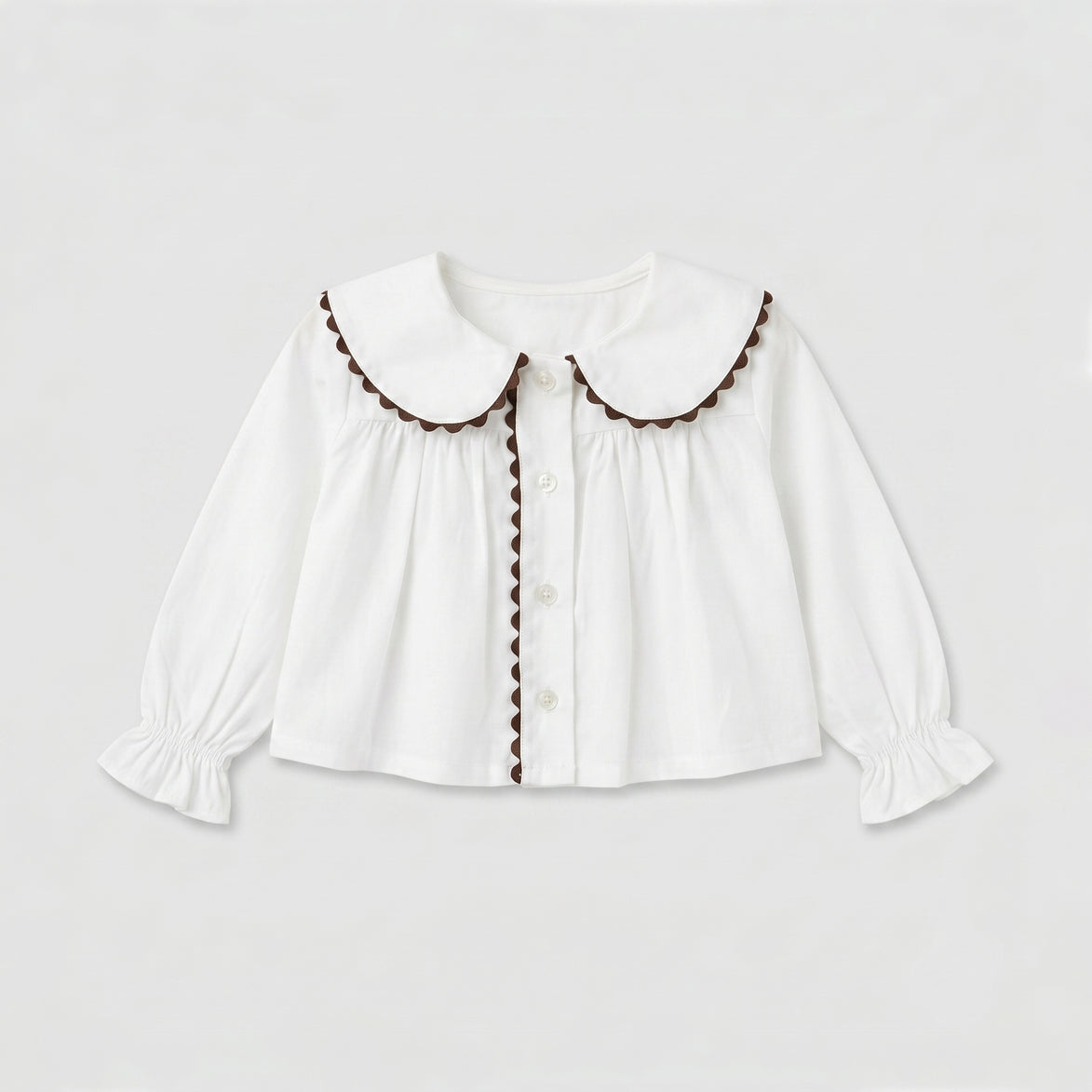 Blusa Peter Pan blanca y chocolate