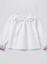Blusa lazada blanca con detalle lila