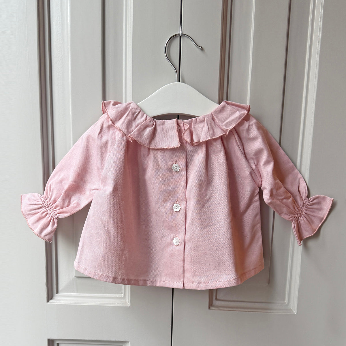 Blusa cuello corazón rosa