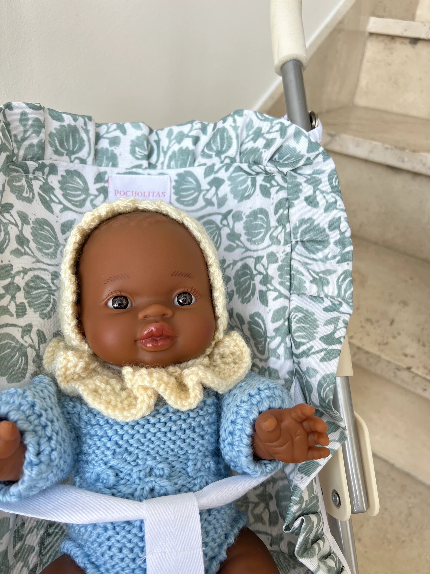 Sillita de paseo plastificada verde de flores