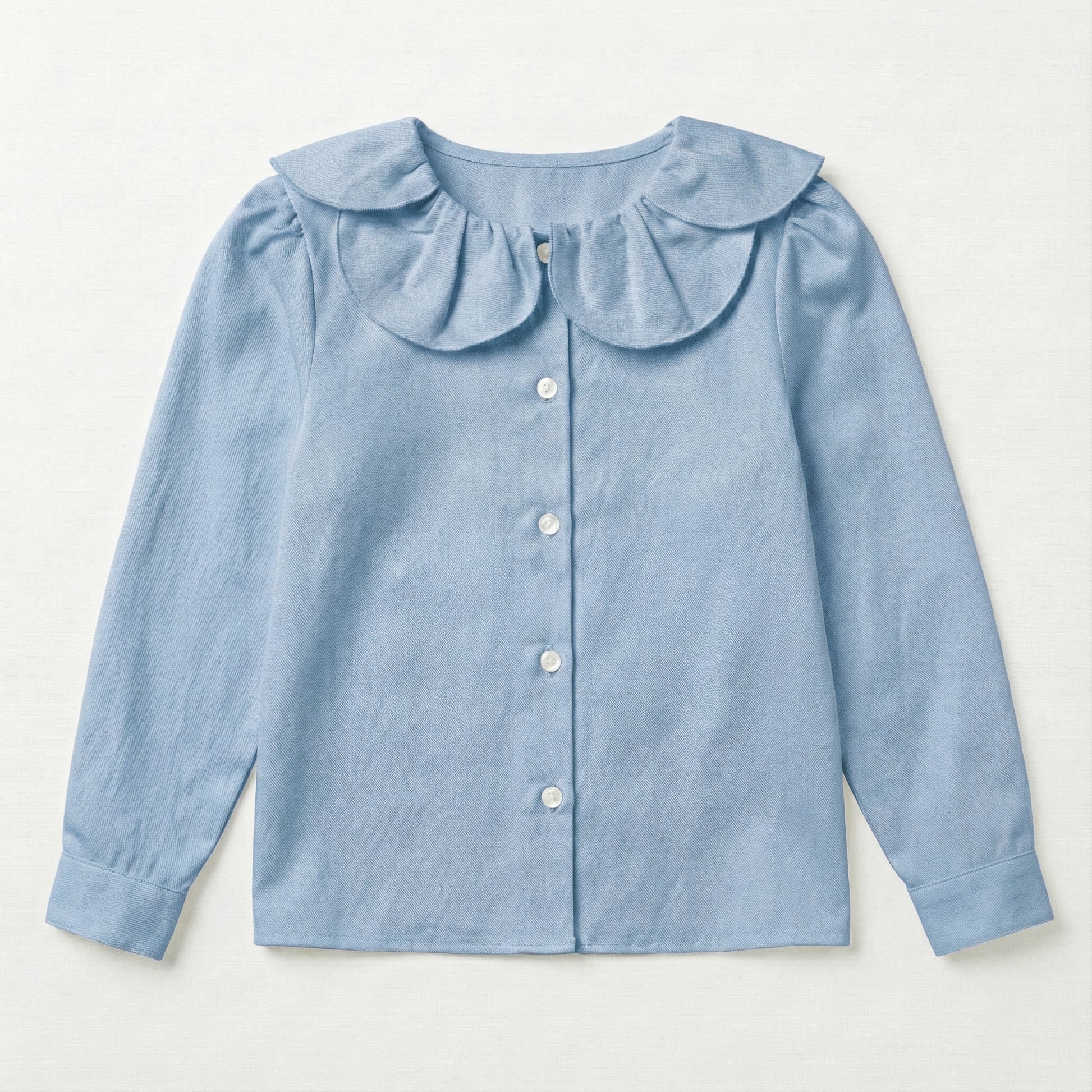 Blusa cuello flor azul