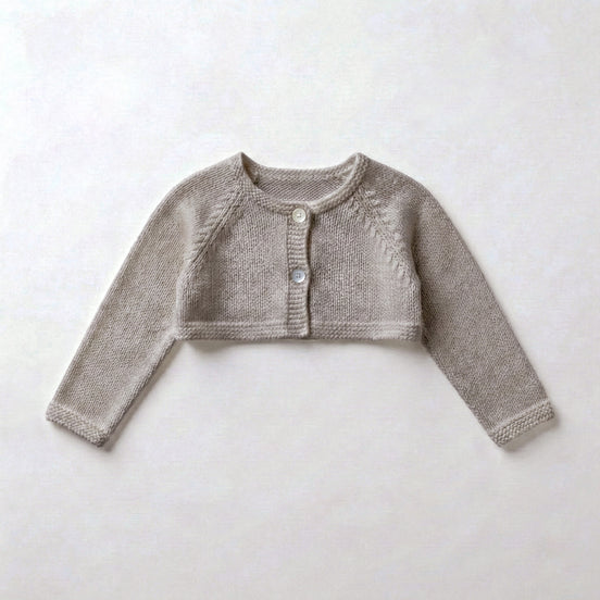 Chaqueta perlé corta beige