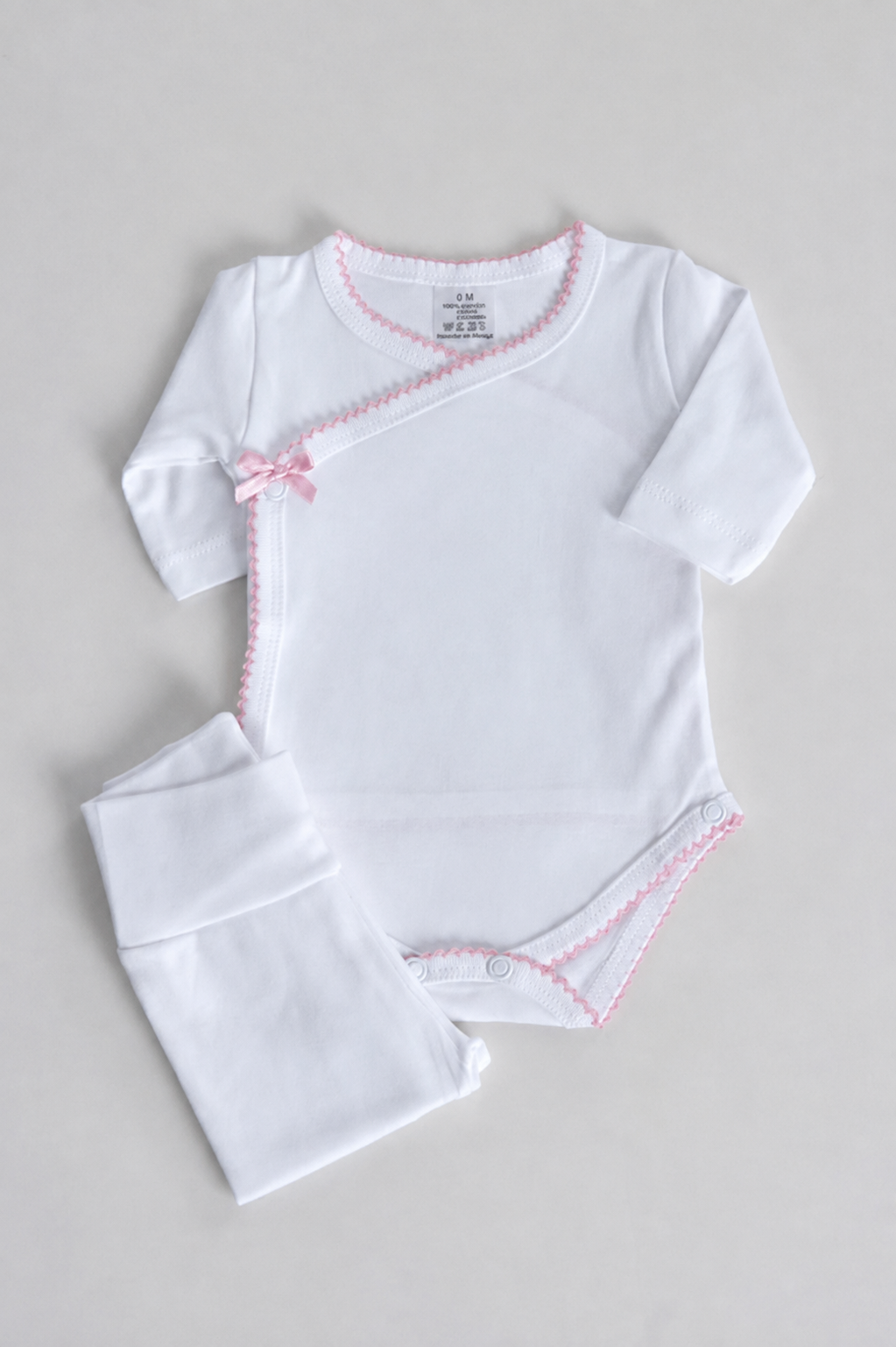 Conjunto body + polaina rosa bebé