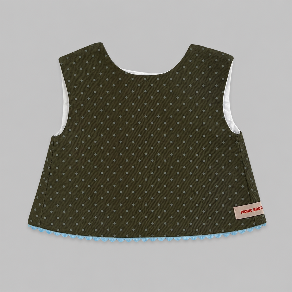 Blusa espalda cruzada polka dots verde kaki y azul celeste