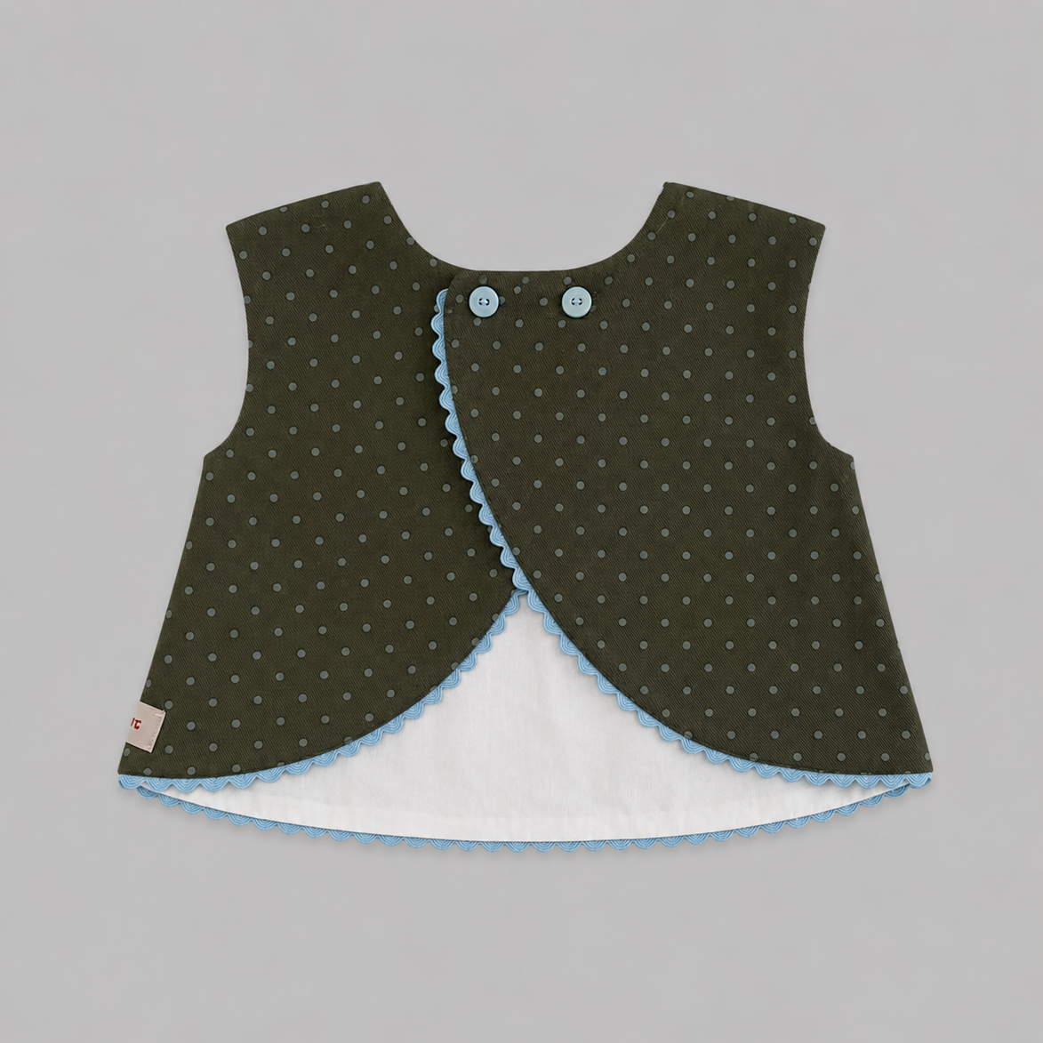 Blusa espalda cruzada polka dots verde kaki y azul celeste