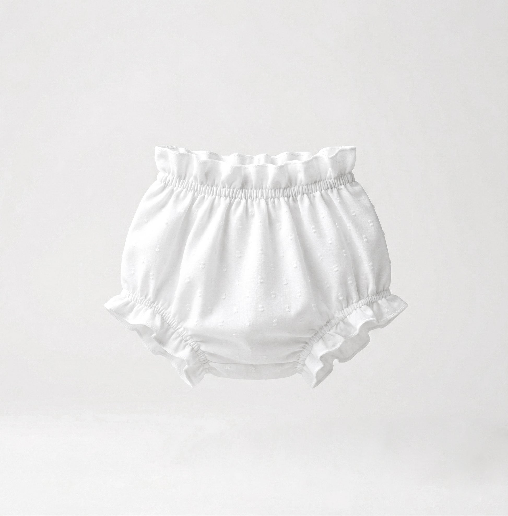 Faldón plumeti bordado