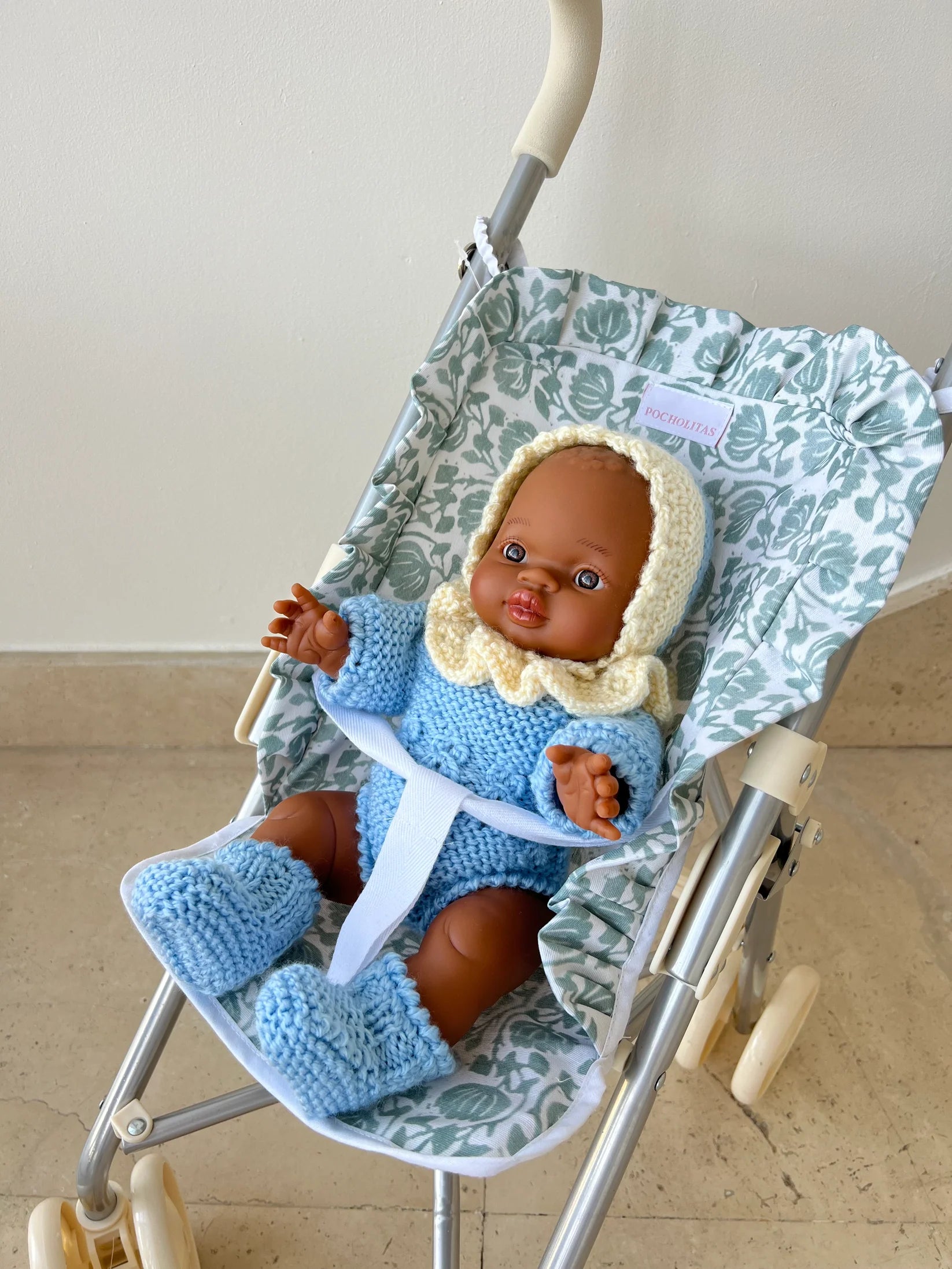 Sillita de paseo plastificada verde de flores