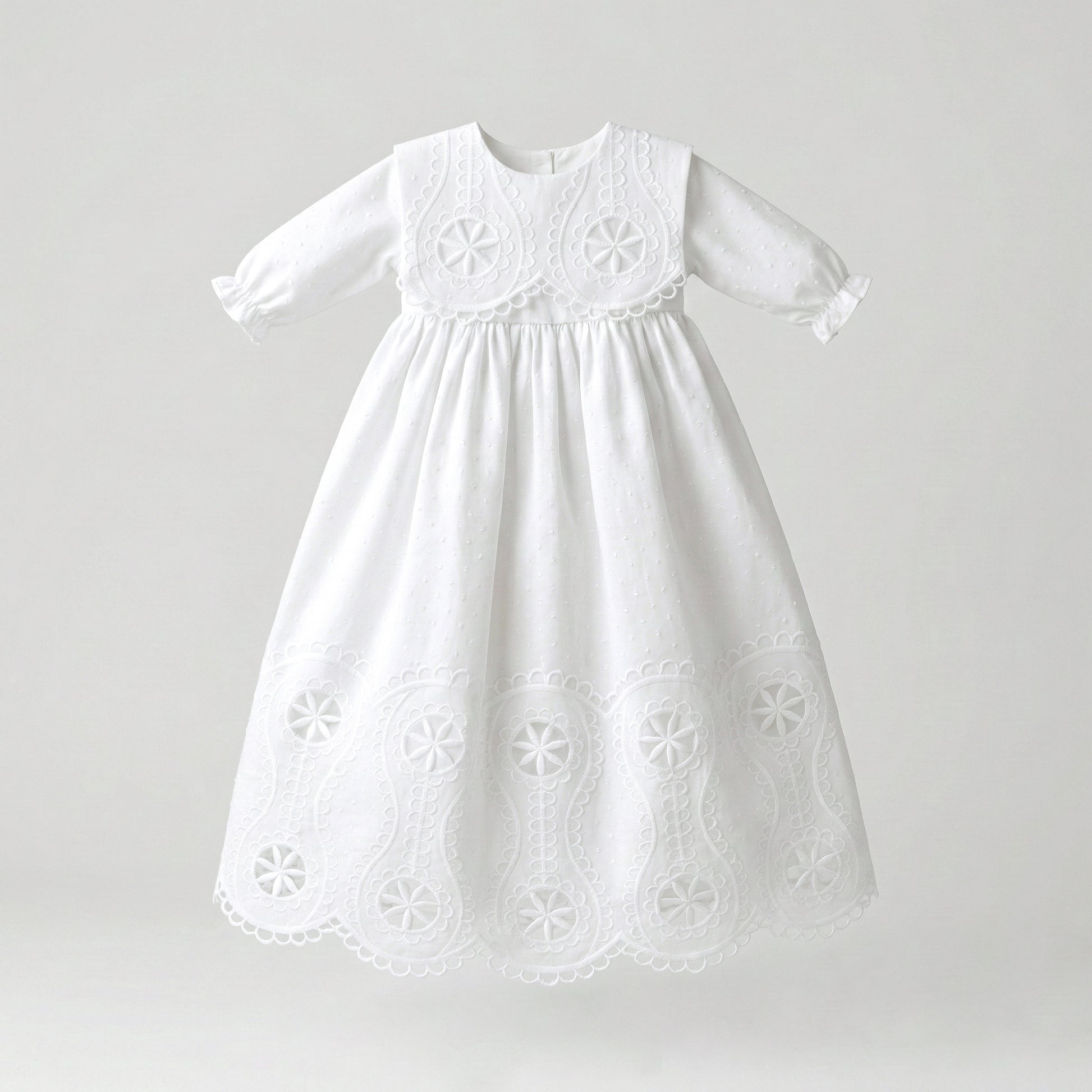 Faldón plumeti bordado manga larga