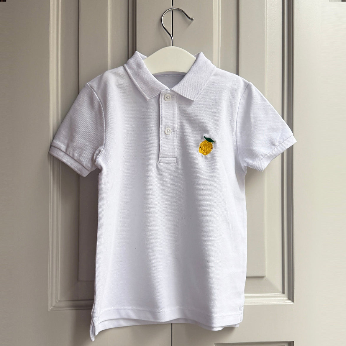 Polo blanco bordado
