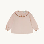 Blusa bebé rosa empolvado
