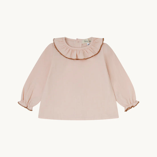 Blusa bebé rosa empolvado