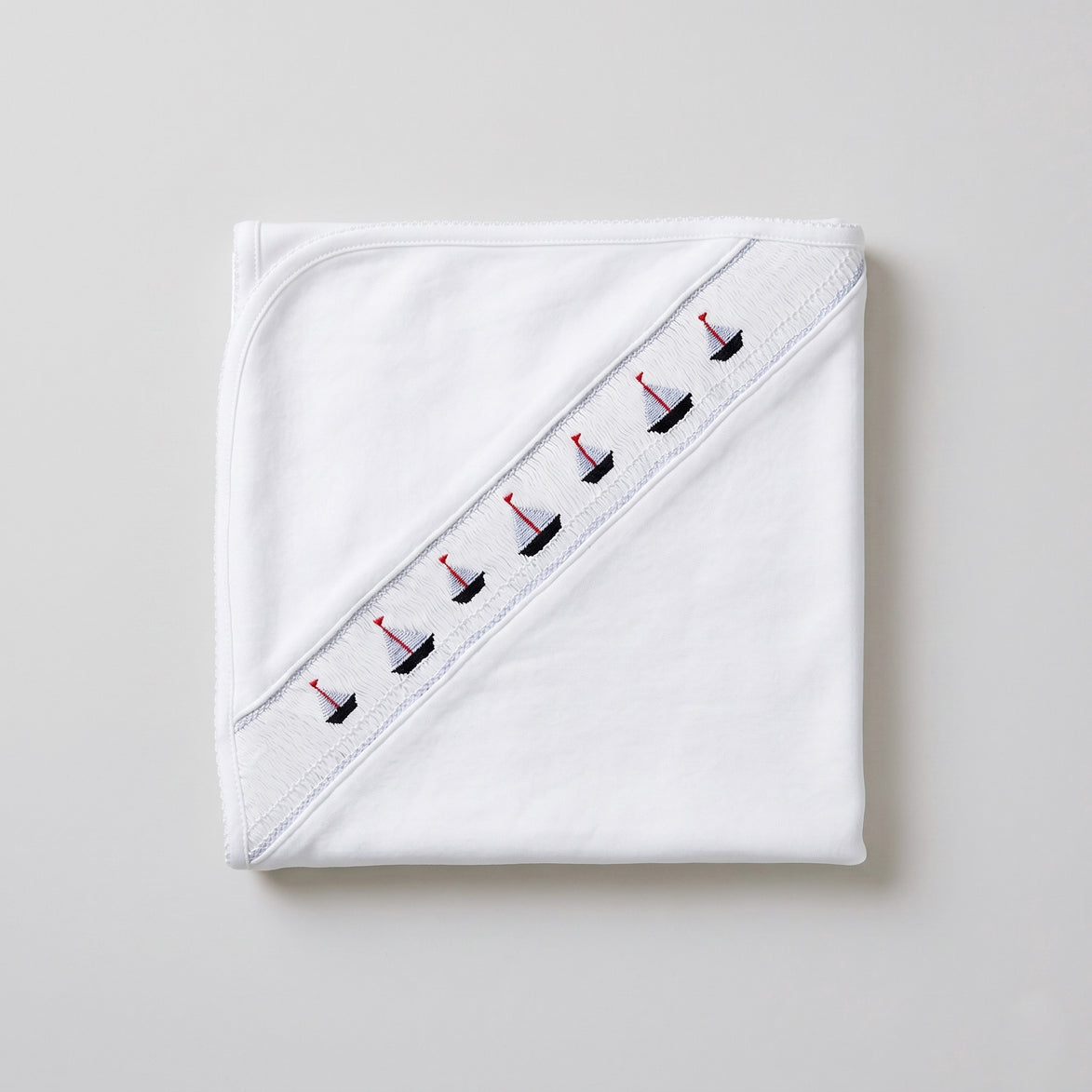 Manta smock barcos blanco