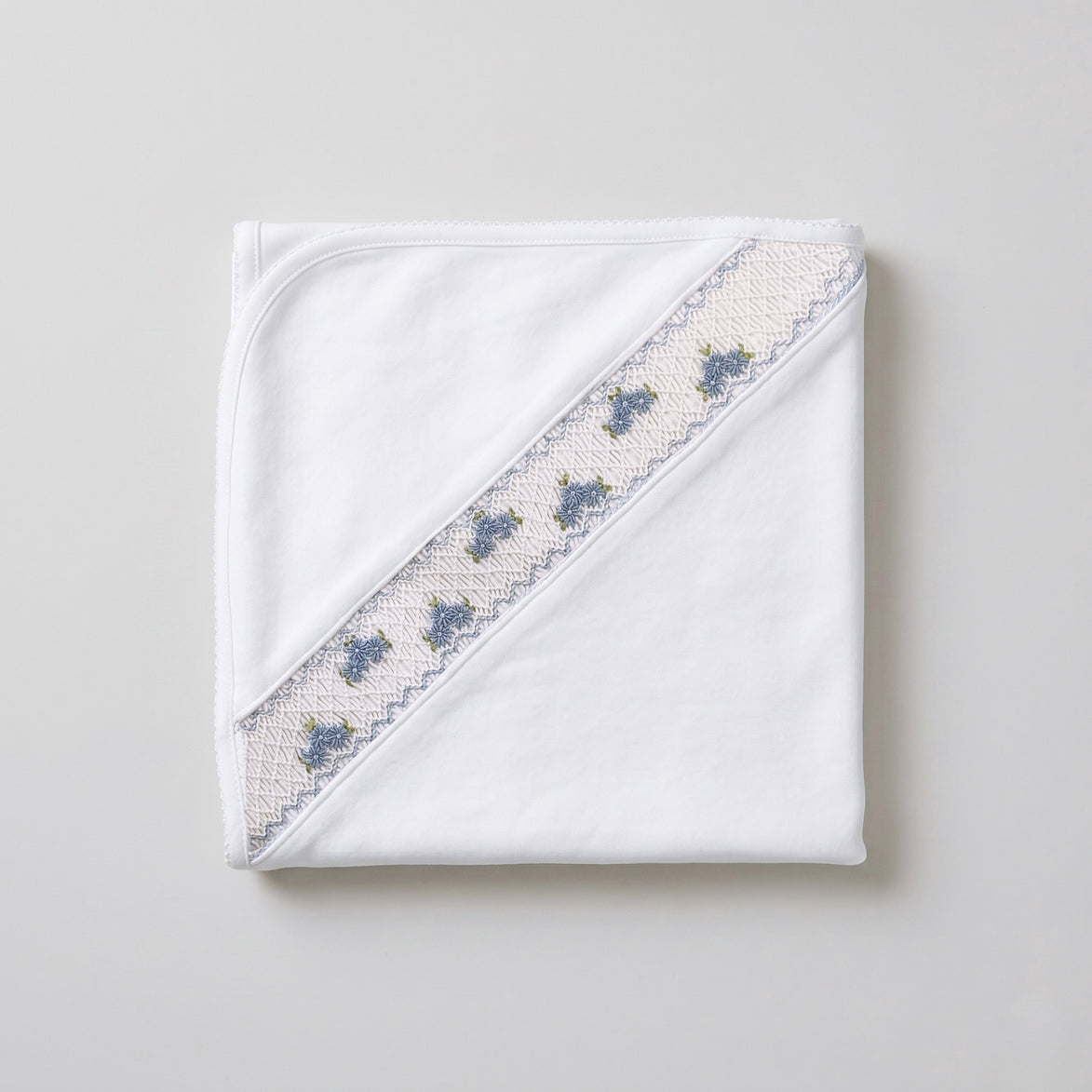 Manta smock flores blanco