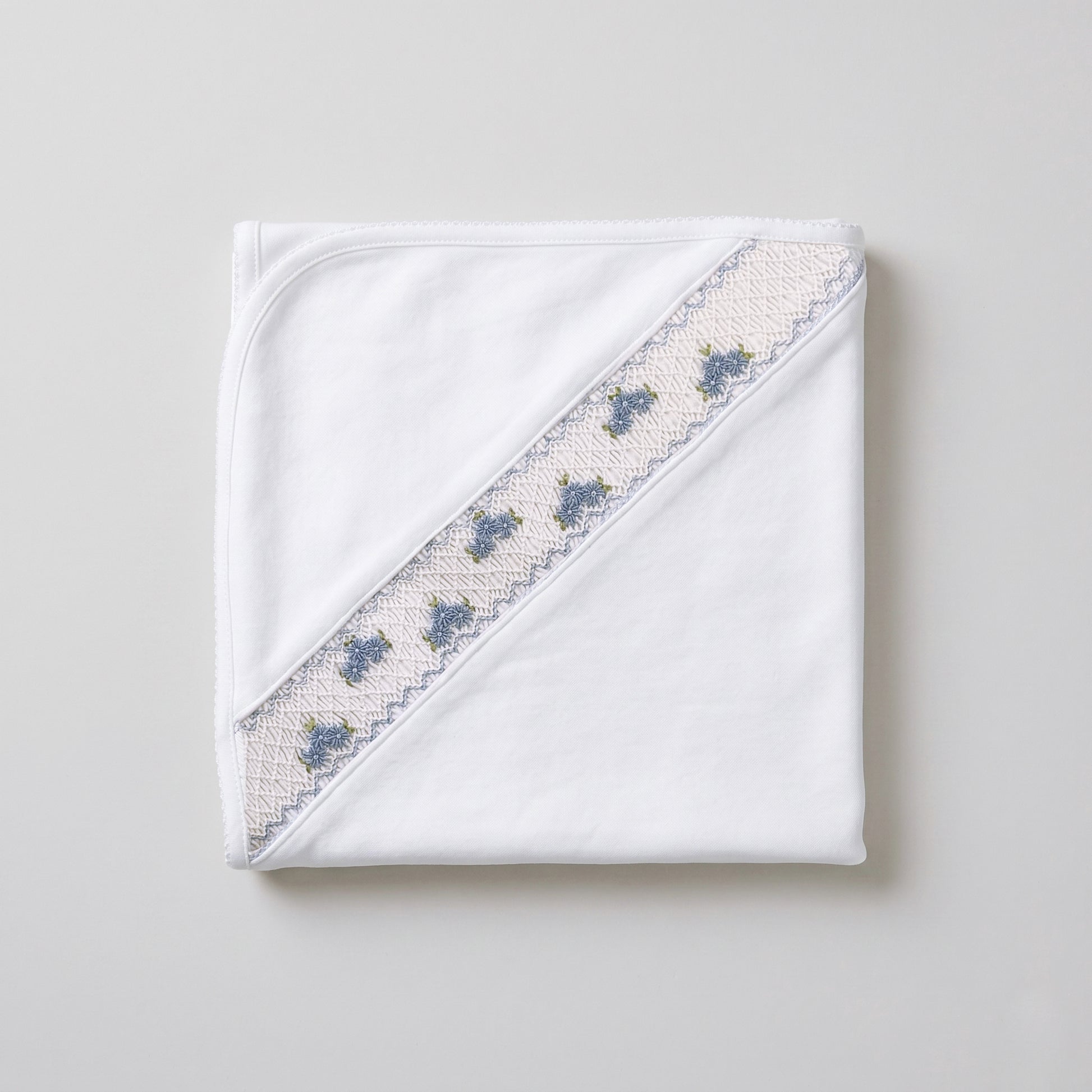 Manta smock flores blanco