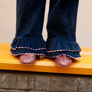 Pantalón doble volante pana azul zigzag rosa