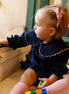 Pelele pana azul zigzag rosa