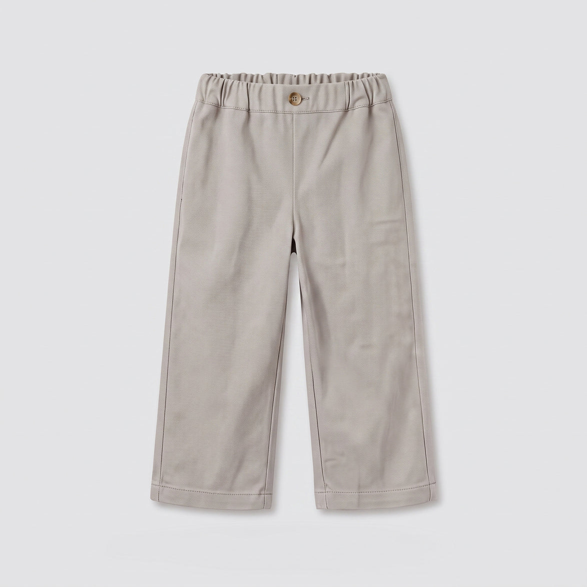 Pantalón beige bolsillos bordados