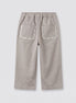 Pantalón beige bolsillos bordados