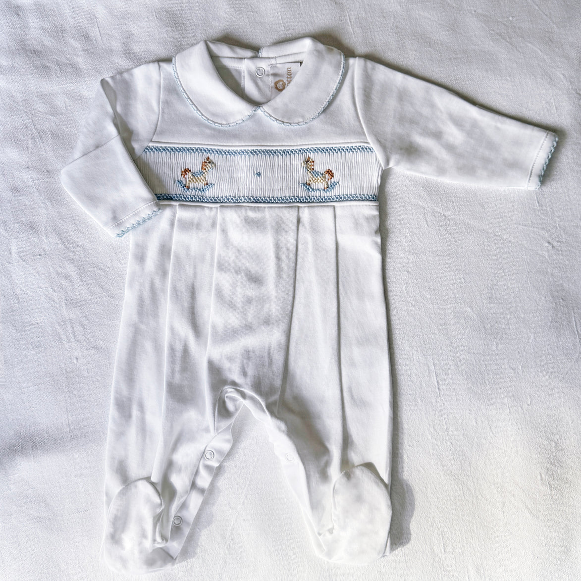Pijama enterizo ponis blanco