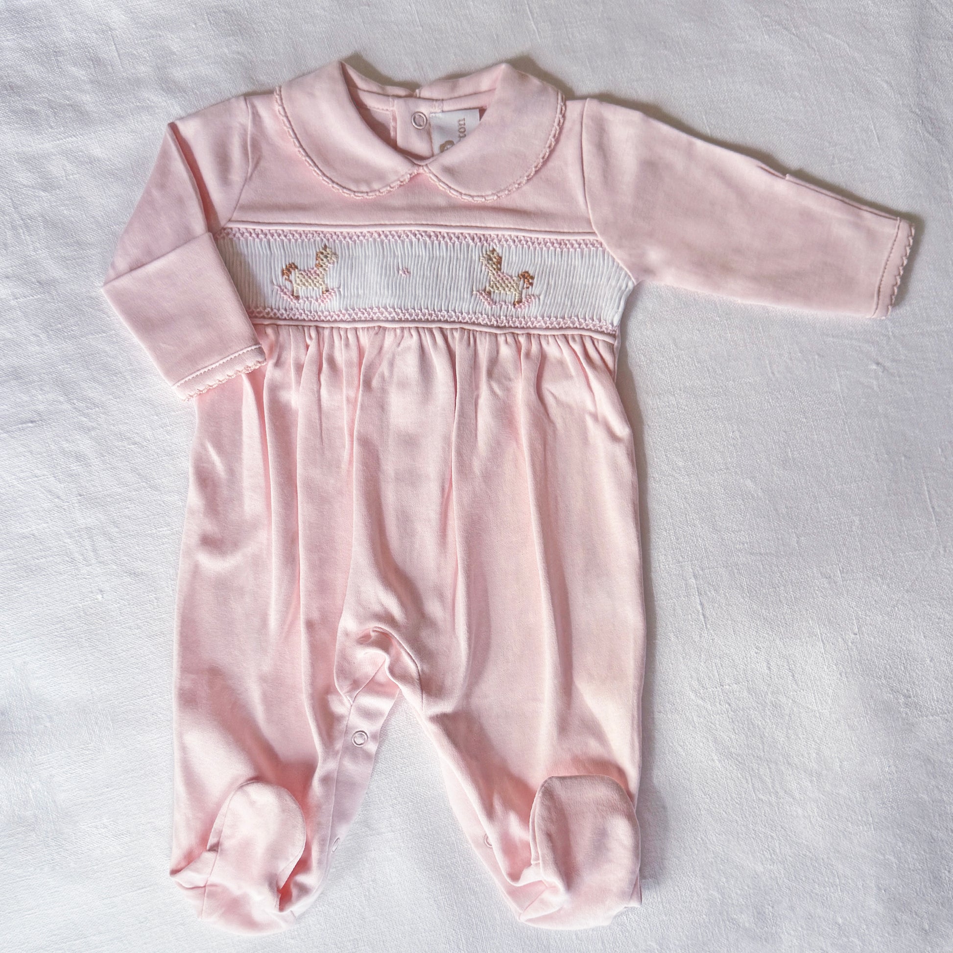 Pijama enterizo ponis rosa