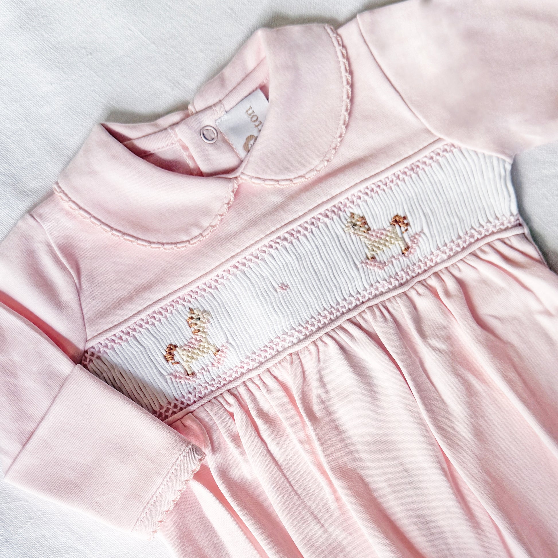 Pijama enterizo ponis rosa