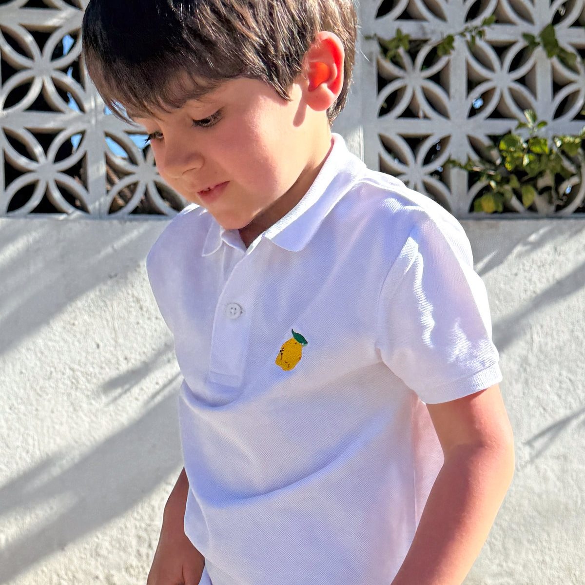 Polo blanco bordado