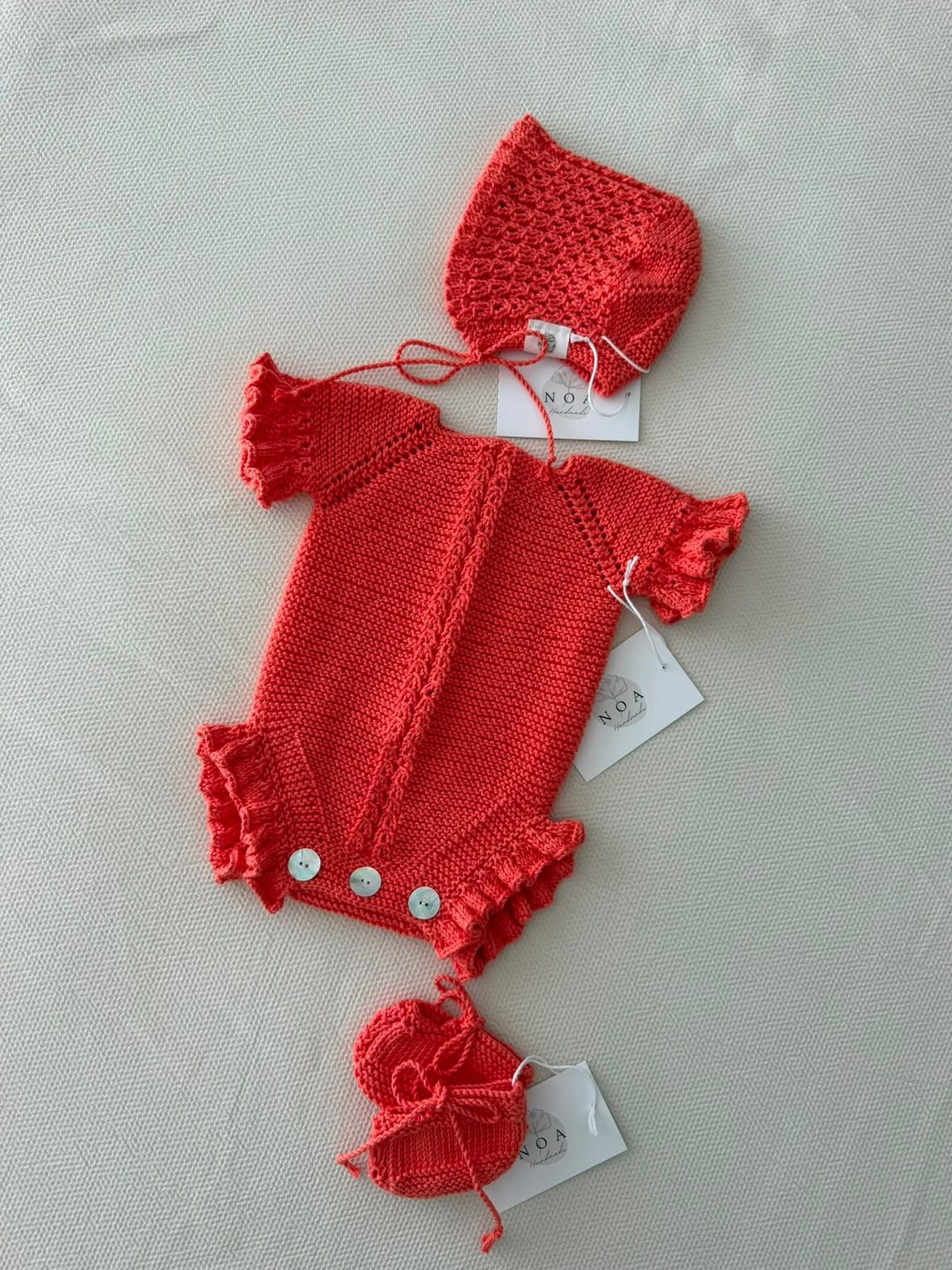 Pelele ochitos coral 0-1m
