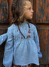 Blusa celeste melange flores