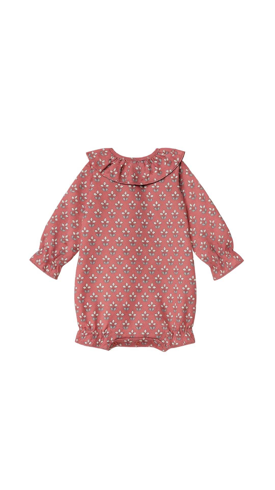 Pelele cuello volante flores blancas fondo teja